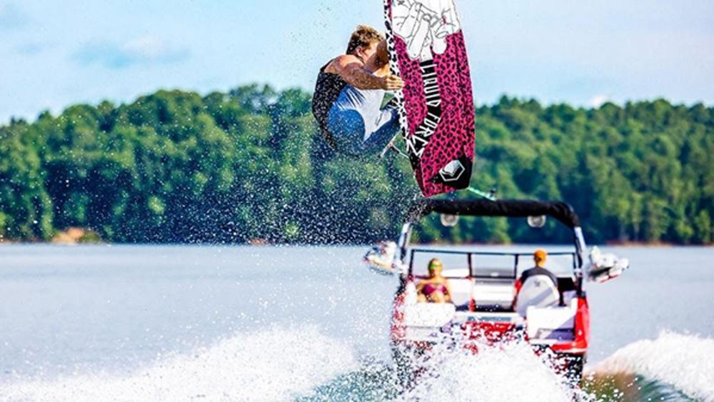 Sterndrive powered boat used for wakeboarding and watersports